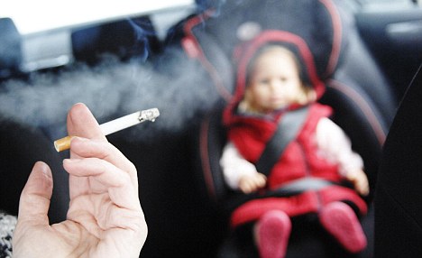 Handout photo issued by NHS Greater Glasgow and Clyde of an image taken during a test to show how second-hand smoke affects a child whilst in a car. The study involved a child-sized doll in a car seat with the latest smoke monitoring equipment attached at its mouth to record the effects of lighting up in the car. PRESS ASSOCIATION Photo. Issue date: Wednesday January 19, 2011. The particles of tobacco poison were so high that they compared with the levels you would expect in a smoky pub before the smoking ban, researchers said. See PA story SCOTLAND Smoke. Photo credit should read: NHS Greater Glasgow and Clyde/PA Wire NOTE TO EDITORS: This handout photo may only be used in for editorial reporting purposes for the contemporaneous illustration of events, things or the people in the image or facts mentioned in the caption. Reuse of the picture may require further permission from the copyright holder.