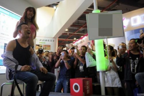 model-feeds-guy-milk-straight-from-her-mouth-at-guangzhou-sex-culture-festival