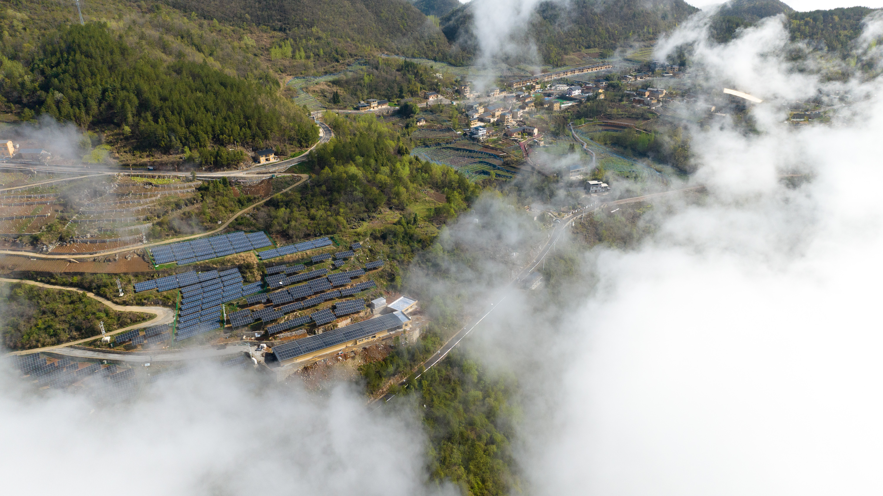 This drone photo shows photovoltaic power station in Tudianzi Village, Badong County, central China's Hubei Province, April 10, 2025. (Photo by Lei Yong/Xinhua)