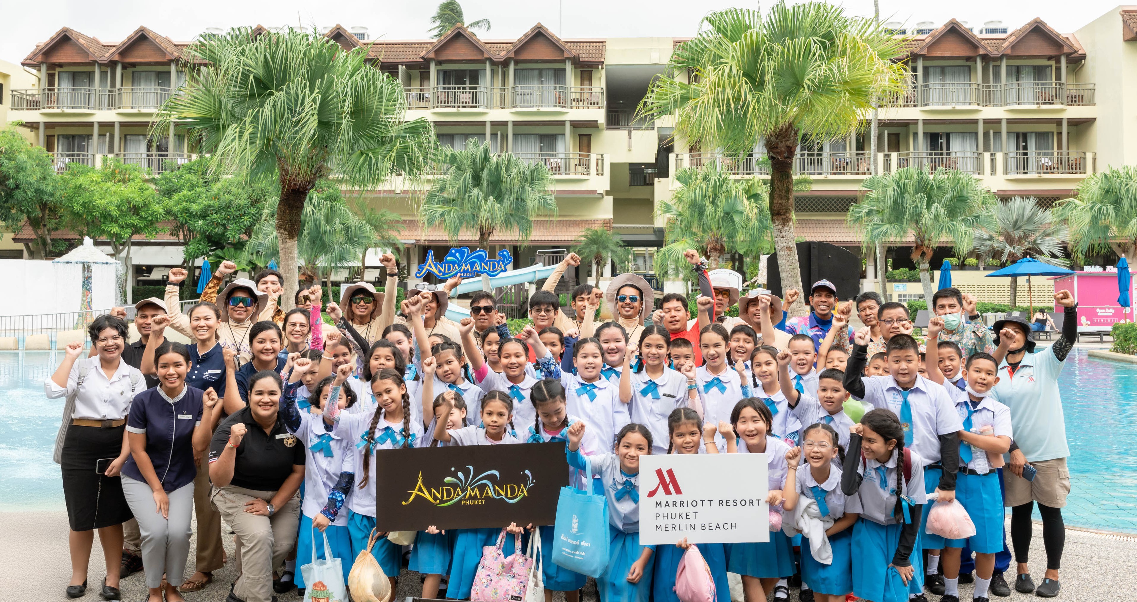 The first student group from Bansainamyen School celebrates the launch of the 'Water Hero' project with representatives from Phuket Marriott Resort & Spa, Merlin Beach and Andamanda Phuket. This collaborative initiative will teach vital water safety skills to local children.