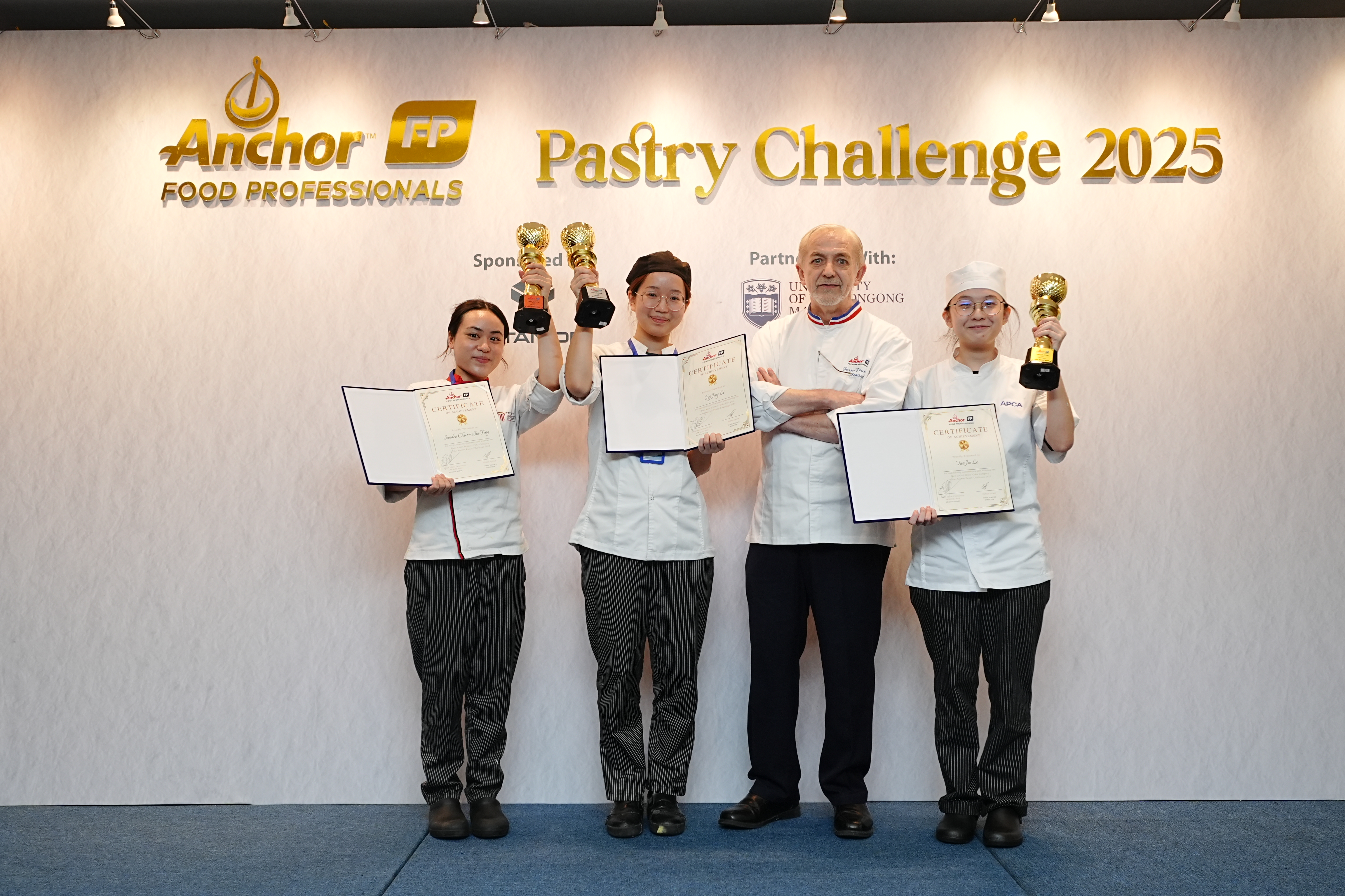 Winners of the Cake Category, alongside Chef Jean-François Arnaud, Head Judge and Anchor Brand Ambassador
