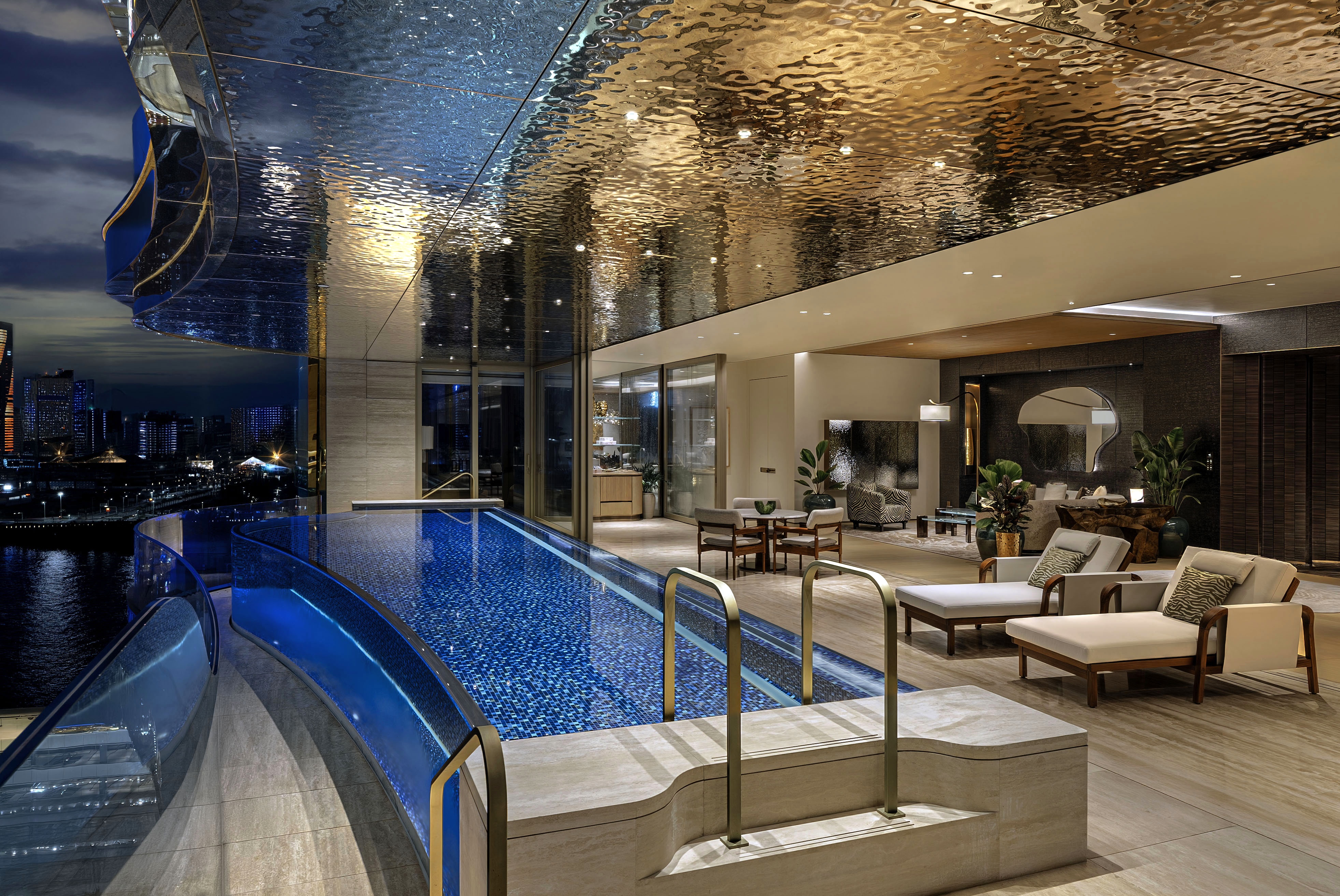 Spacious, light-filled Capella Penthouses feature private balconies with transparent, infinity-edge pools that invite guests to unwind overlooking panoramic views of Macau's glittering architecture.
