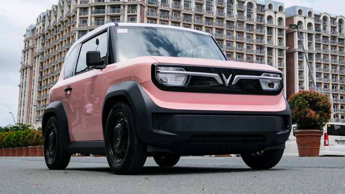 A VinFast VF 3 electric vehicle in an urban area in Metro Manila.