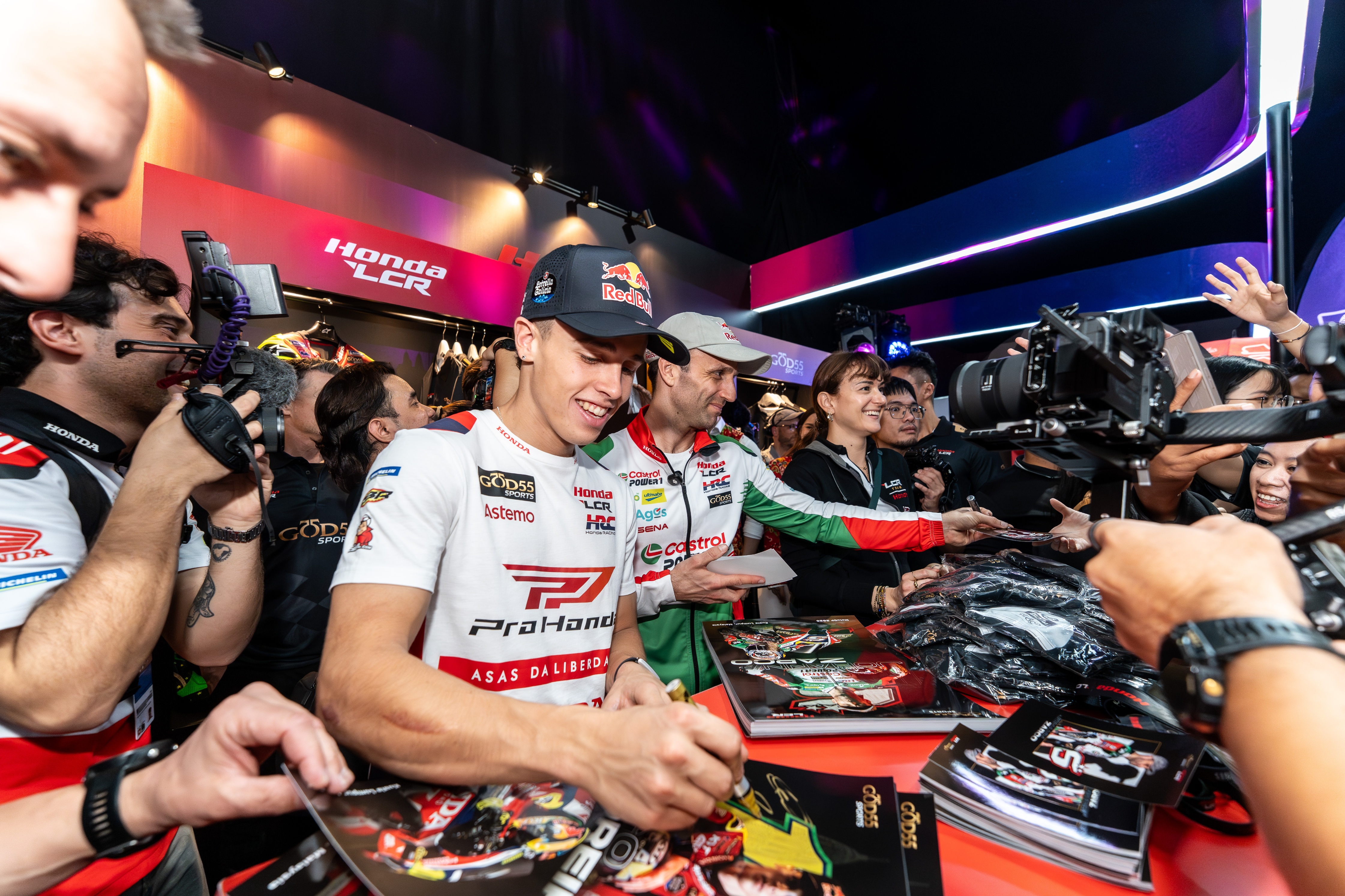 Johann Zarco and Diogo Moreira autograph session