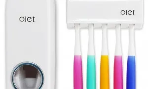 White Toothpaste Dispenser With Toothbrush Holder