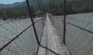 Man Was Walking On A Shaking Bridge