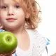 Girl Holding Two Apples