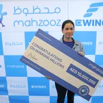 Arlene Filipina Mahzooz Millionaire Photo AETOSWire