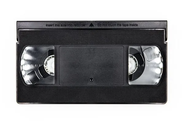 Front side of a old vhs videocassette, analog retro video tape isolated on white background, topview