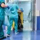 Hospital Cleaning Staff Enter An Operating Room With A Cleaning Cart 1536x1024 1