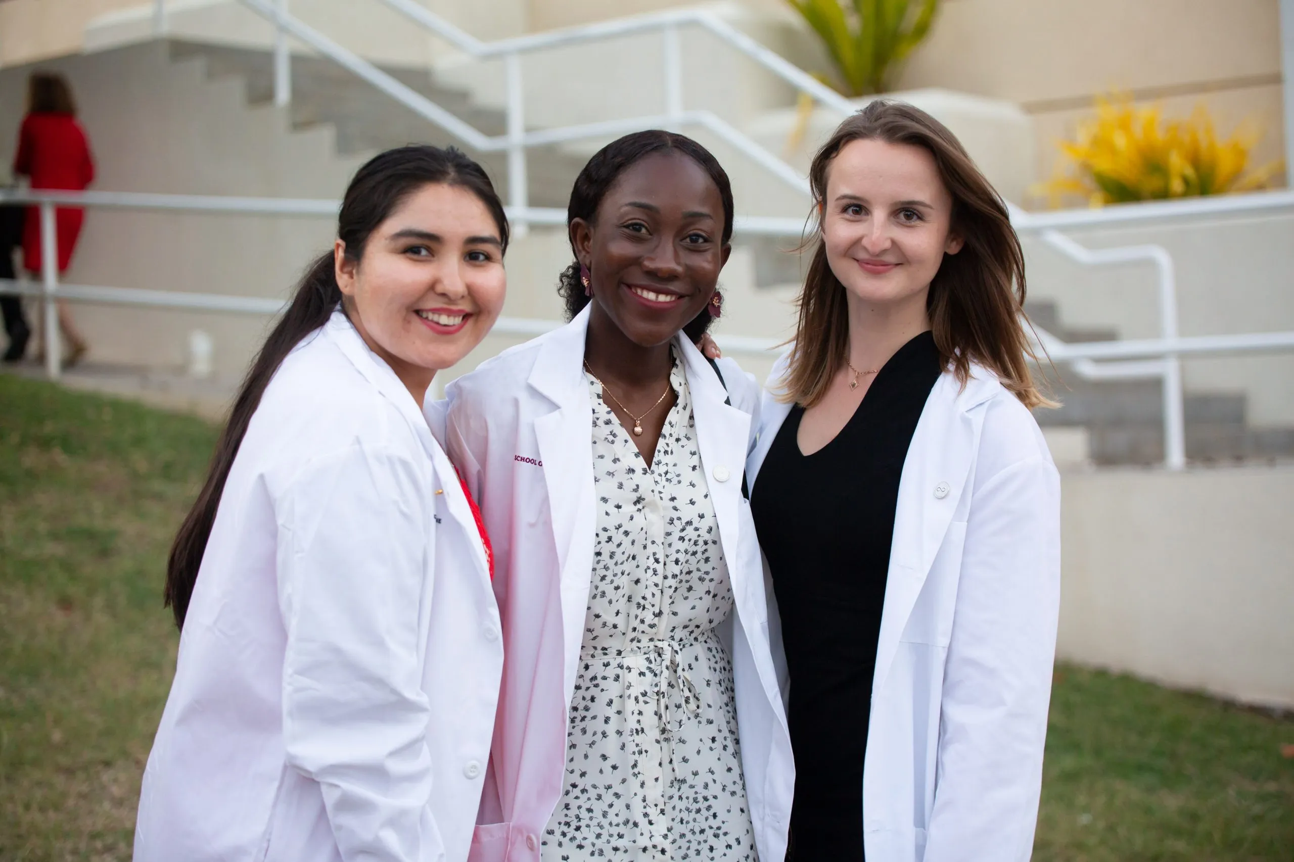3-female-students-white-coats-2