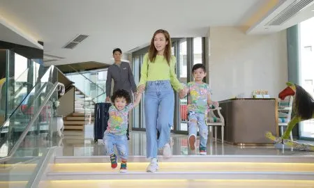 Family Checks In To Dorsett Wanc