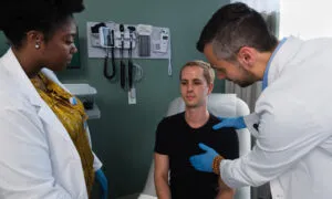 2 Students Action Shot Examinati